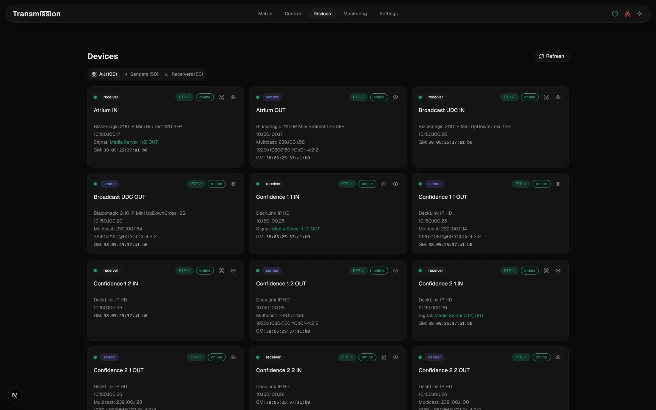 Transmission device list showing Blackmagic 2110 IP Mini and DeckLink IP cards with IP address, multicast group, video format and PTP lock state on each card.