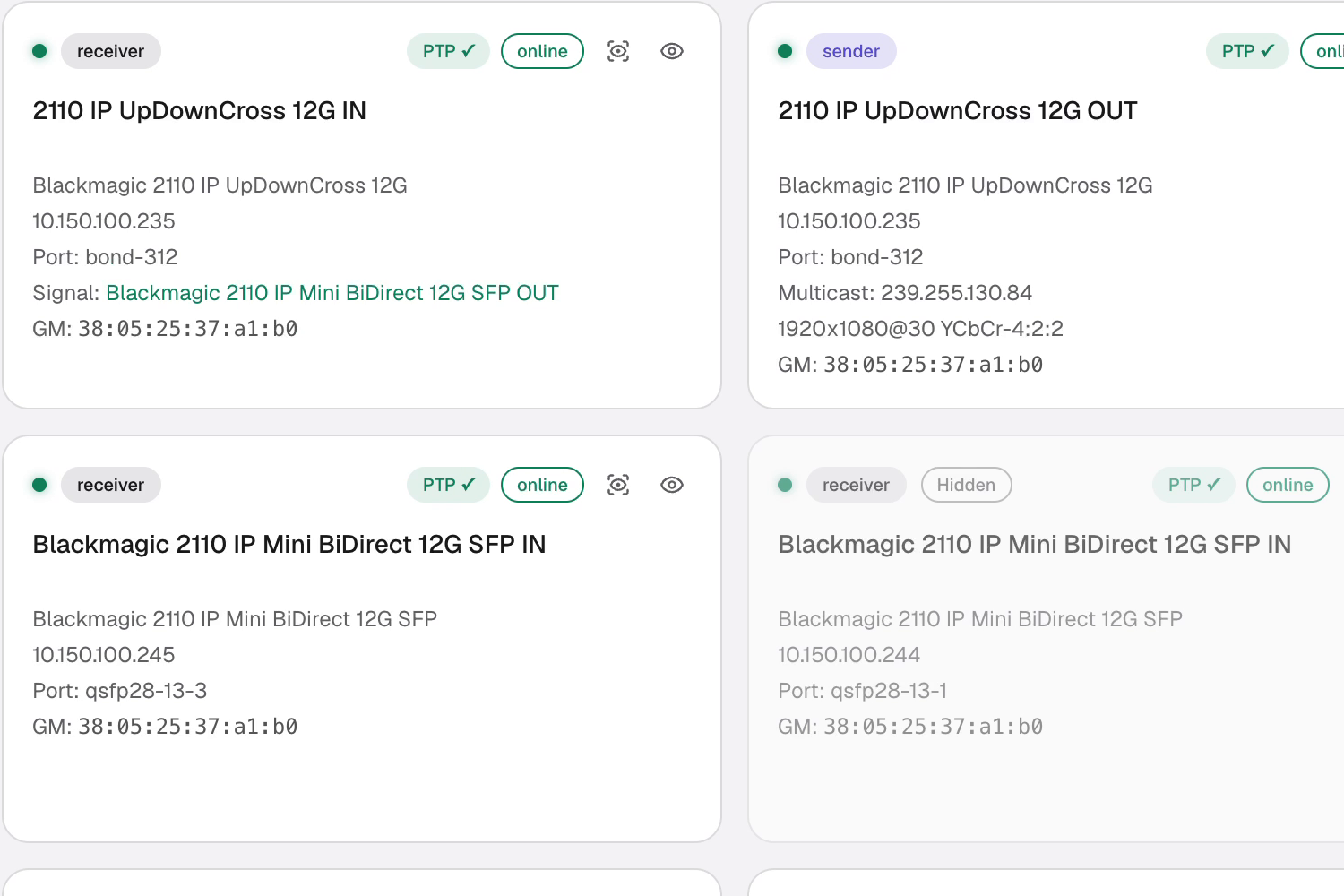 Transmission device list showing Blackmagic 2110 IP UpDownCross and 2110 IP Mini BiDirect cards with IP address, switch port, multicast group, video format and PTP lock state on each card.